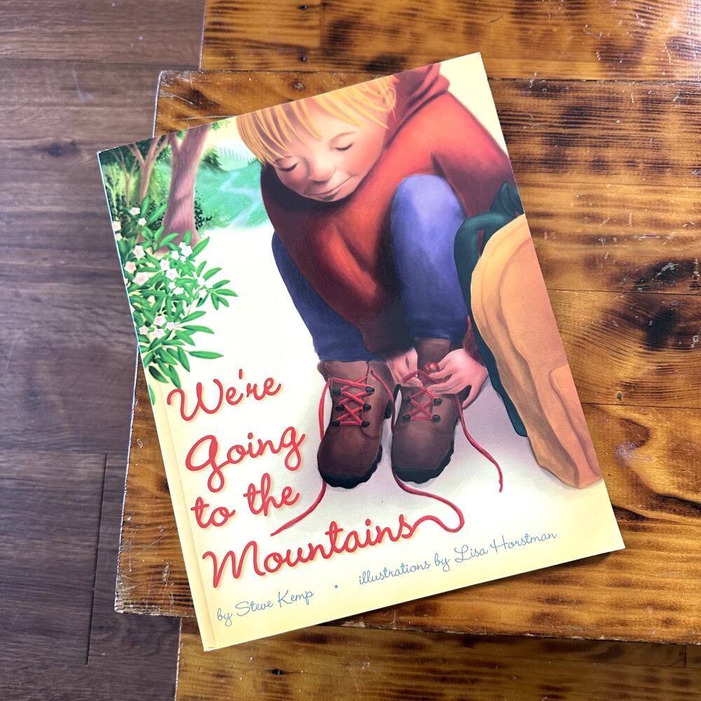 We're Going To The Mountains Paperback Book